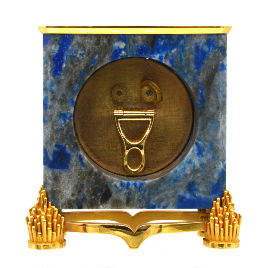 Late 1960s French 18ct gold and lapis lazuli mantlepiece clock by de Brysal, featuring intricate craftsmanship.