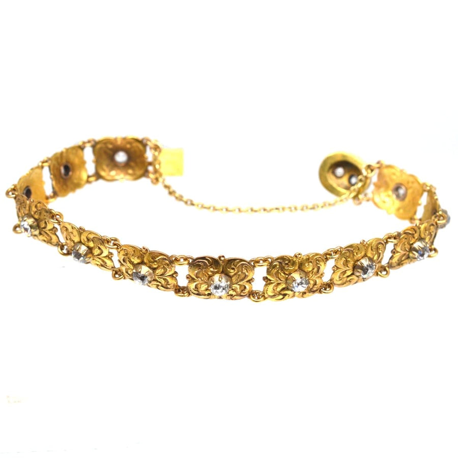 Art Nouveau 18ct gold bracelet with old mine cut diamonds and foliage design, perfect for antique jewelry collectors.