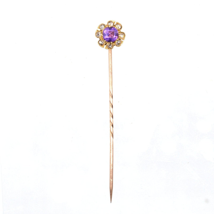 Late Victorian 15ct gold tie pin featuring an amethyst and diamond cluster design.