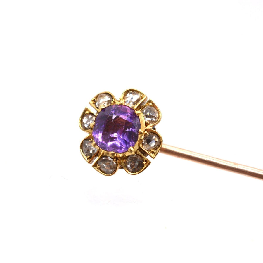 Late Victorian 15ct gold tie pin featuring an amethyst center surrounded by diamond petals.