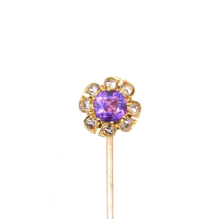 Late Victorian 15ct gold amethyst and diamond cluster tie pin, featuring a vibrant amethyst surrounded by sparkling diamonds.