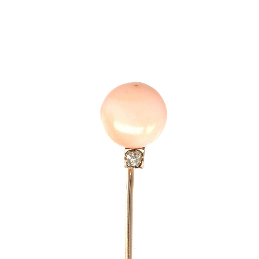 Late Victorian 15ct gold tie pin with Angel Skin Coral and old mine cut diamond, showcasing exquisite antique craftsmanship.
