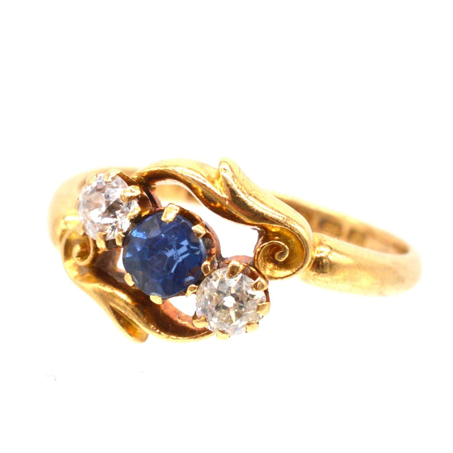 Late Victorian 18ct Gold, Sapphire and Diamond Three Stone Crossover Ring