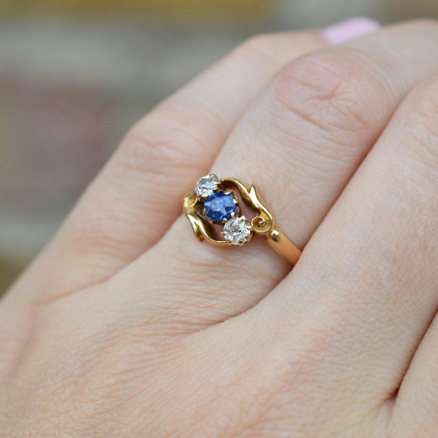 Late Victorian 18ct Gold, Sapphire and Diamond Three Stone Crossover Ring