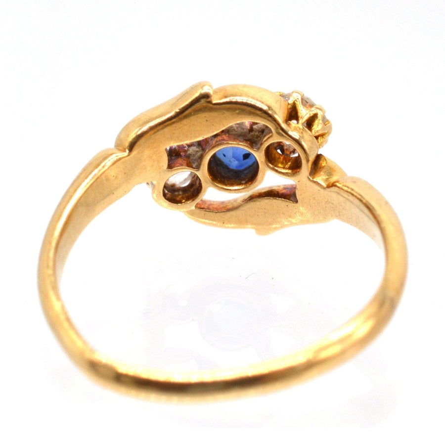 Late Victorian 18ct Gold, Sapphire and Diamond Three Stone Crossover Ring