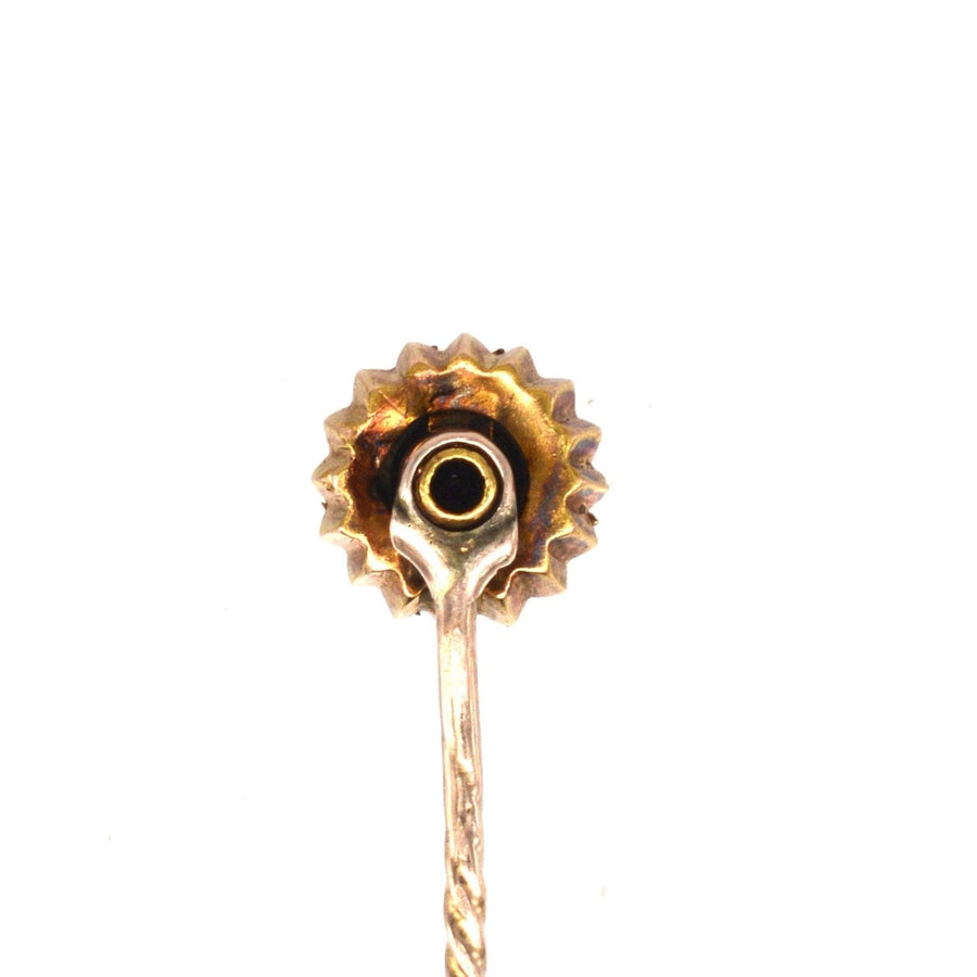 Late Victorian 9ct gold tie pin featuring a diamond, circa 1880s, with star motif and rope detail.