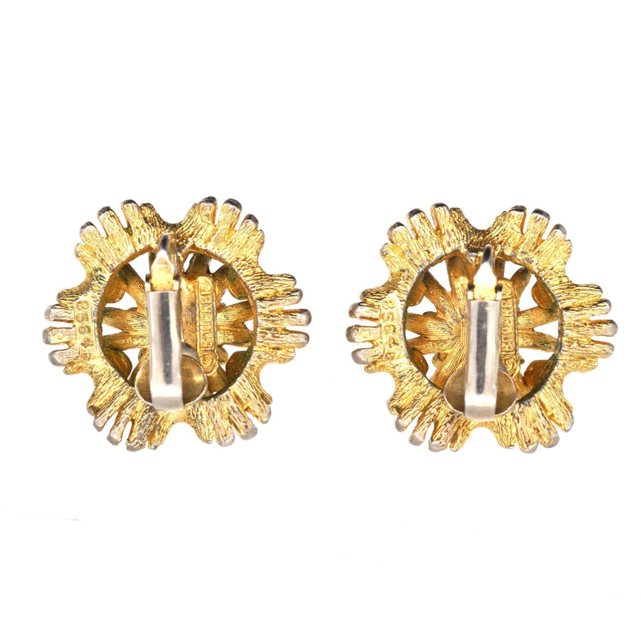 Marcel Boucher 1960s gilt metal clip-on earrings with fun sunburst design, comfortable and stylish accessory.