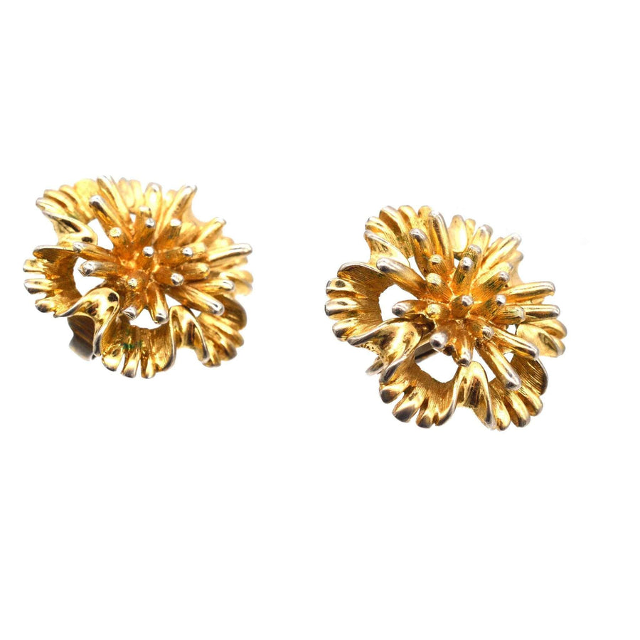 Marcel Boucher 1960s gilt metal clip-on earrings, featuring a fun floral design in gold tone, signed and numbered.
