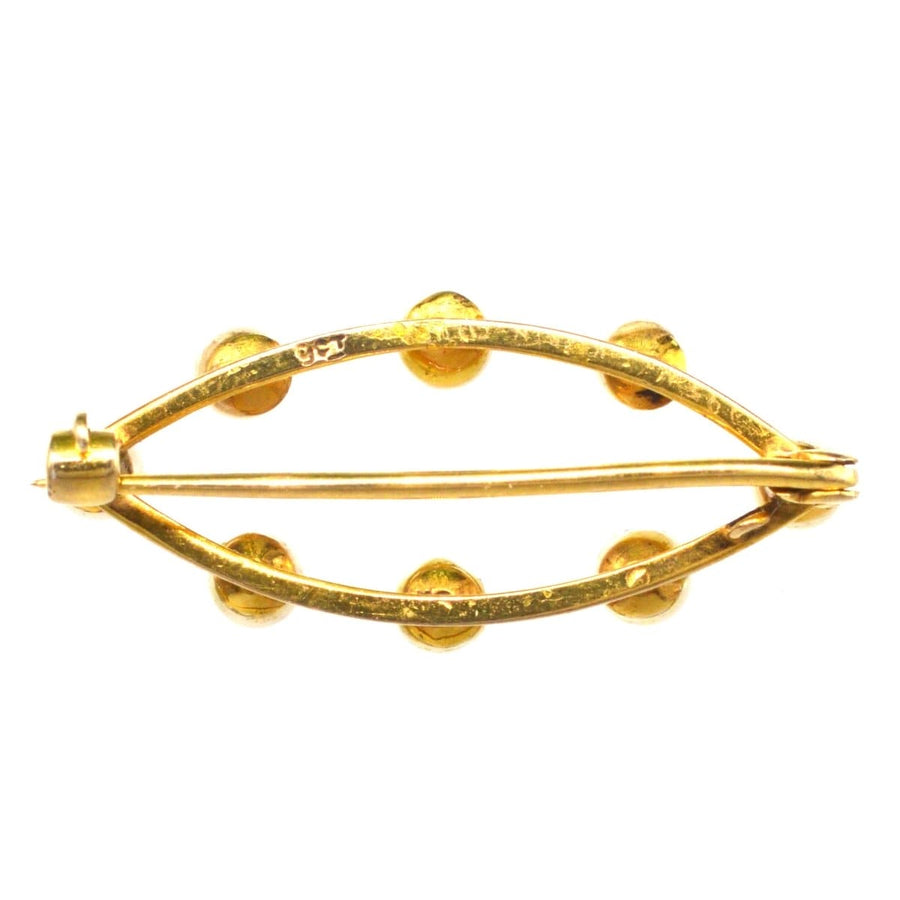 9ct gold marquise bar brooch featuring eight cultured pearls, showcasing a classic mid-century jewelry design.