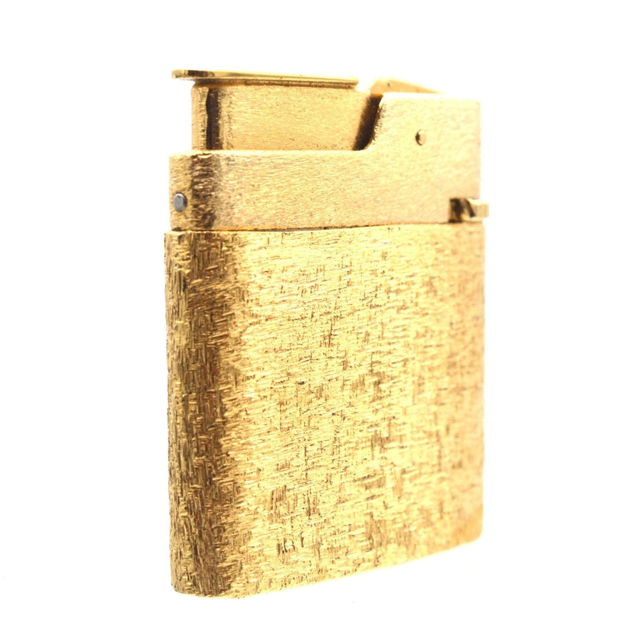 Vintage gold lighter from Mid Century Norman Hartnell jewellery set, stylish design, unique collectible accessory.
