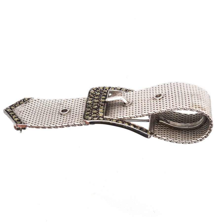 Mid Century silver brooch with marcasites, showcasing a classic buckle design and vintage elegance.