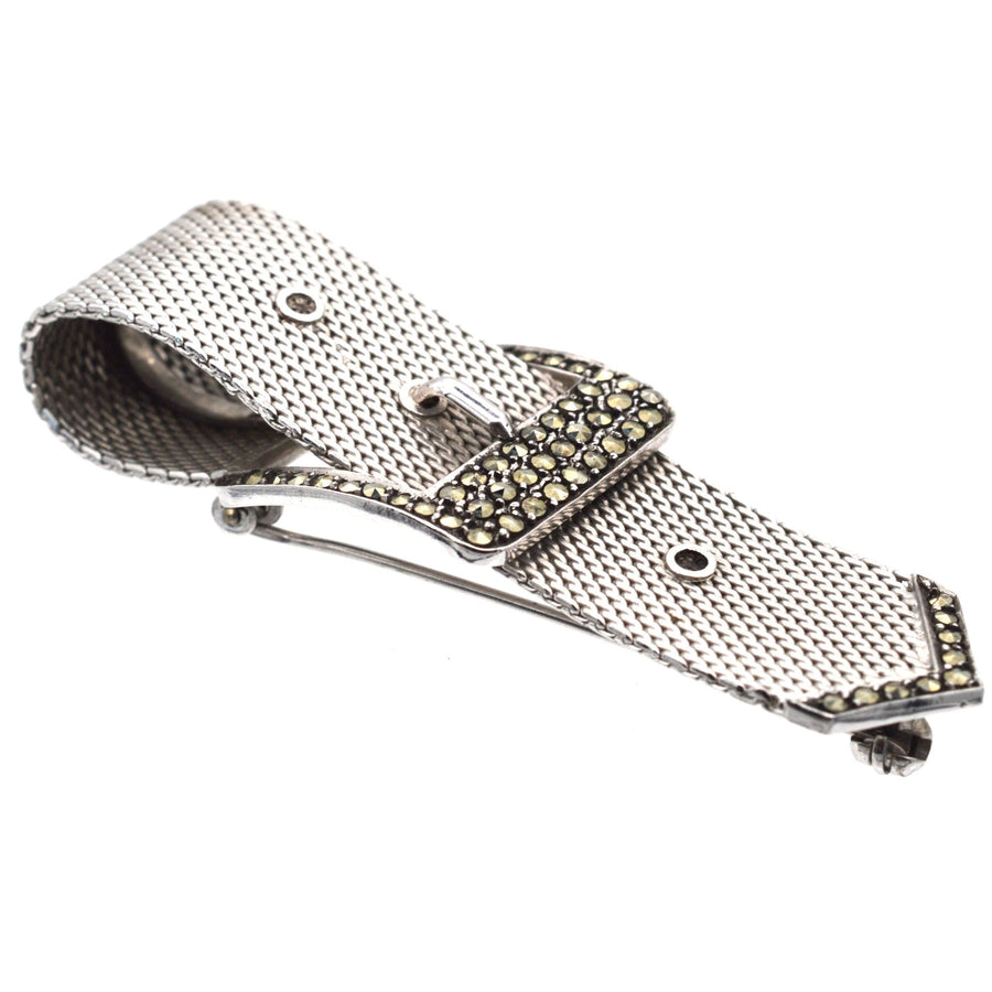Mid Century silver buckle brooch with marcasite detailing, showcasing timeless design and vintage elegance.