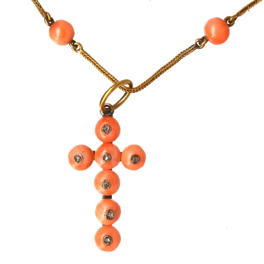 Mid Victorian 15ct gold coral chain necklace with coral and diamond cross pendant, featuring circular coral beads.