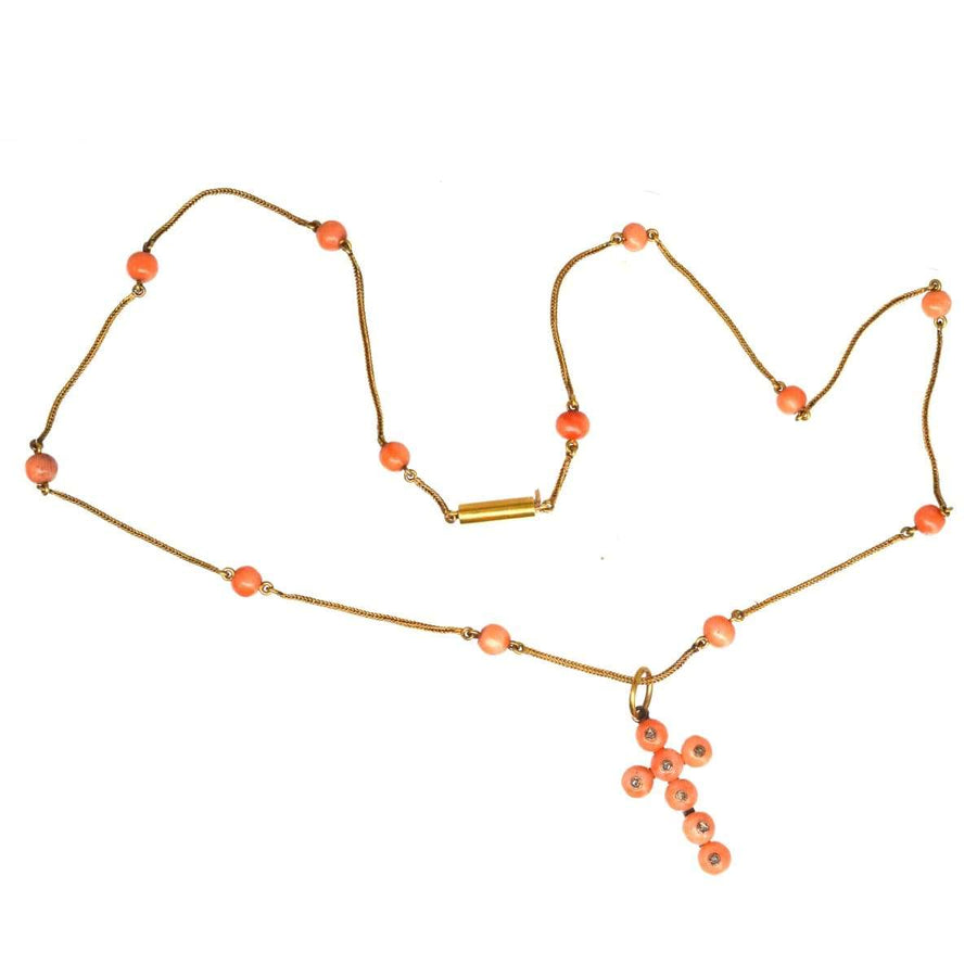 Mid Victorian 15ct gold necklace featuring coral beads and diamond cross pendant, dating back to the 1840s-1860s.