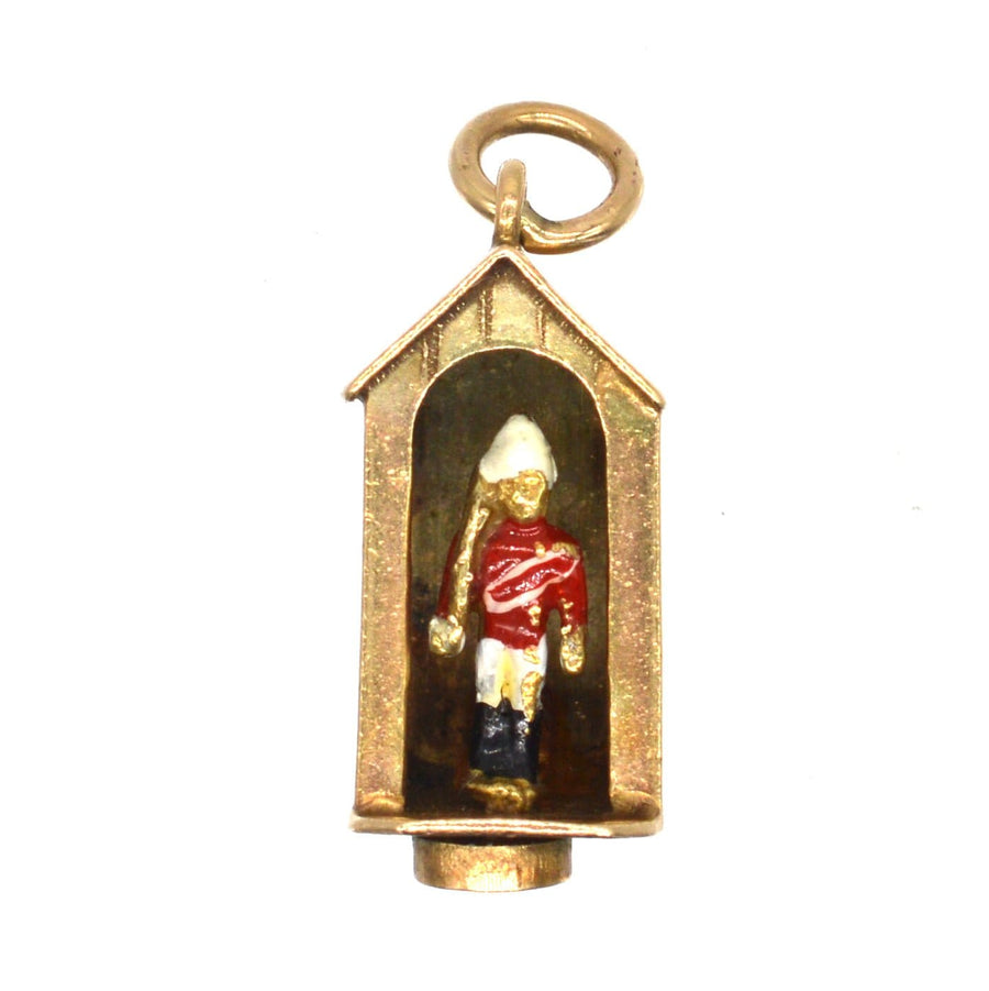 Miniature Queen's Life Guard charm in gold and enamel, depicting a soldier in a sentry box by Georg Jensen Ltd.