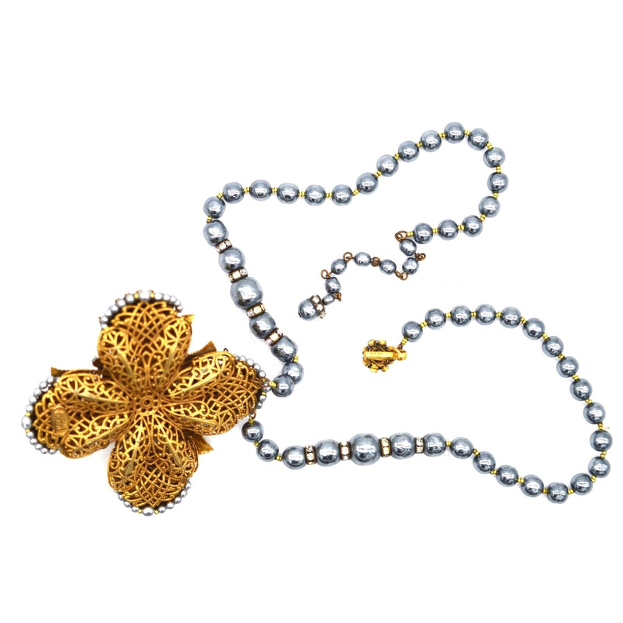 Mid Century Miriam Haskell gold gilt necklace with black pearl and rhinestone cross pendant, a stunning statement piece.
