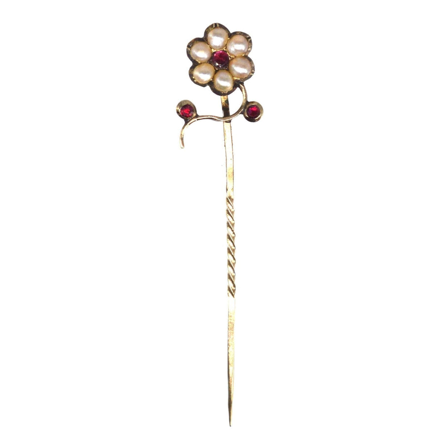 Regency 9ct gold tie pin featuring a flower design with split pearls and garnet accents, ideal for silk ties.