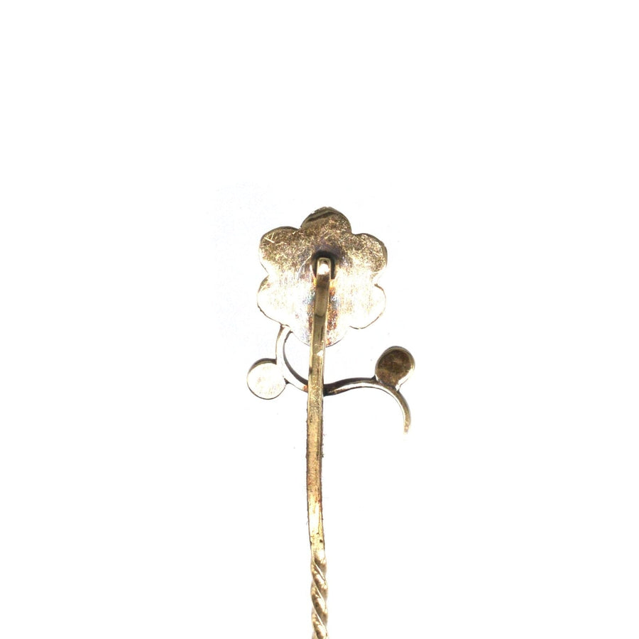 Regency 9ct gold flower tie pin featuring split pearls and garnets, elegant accessory for silk ties.