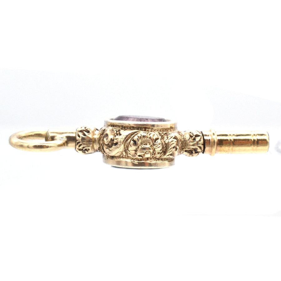 Regency gold cased watch key featuring bloodstone and amethyst paste, elegant vintage pendant from the 1820s.