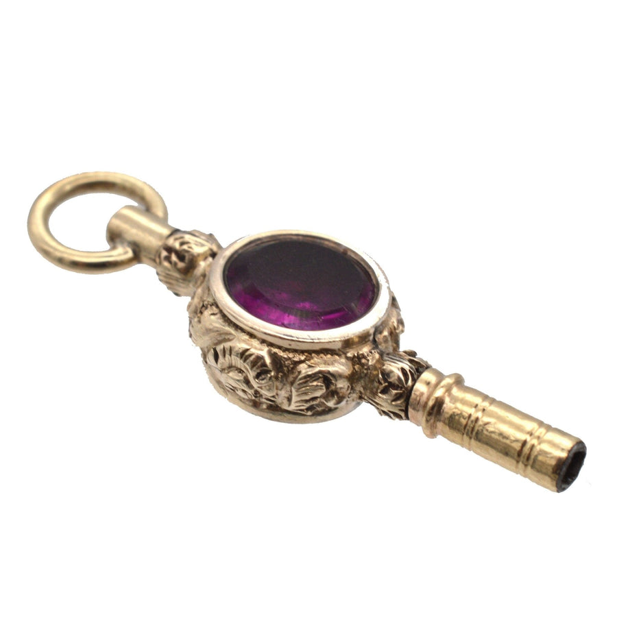 Regency gold cased watch key featuring bloodstone and amethyst paste, elegant pendant design, 1820s craftsmanship.