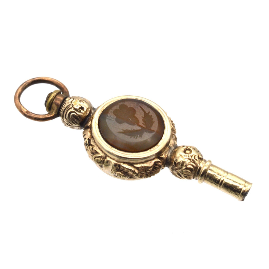 Regency gold cased watch key with intaglio rose on agate, elegant pendant from the 1820s.