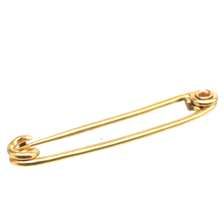 Vintage 9ct gold stock pin brooch, a classic safety pin design by Cropp and Farr for stylish and practical use.