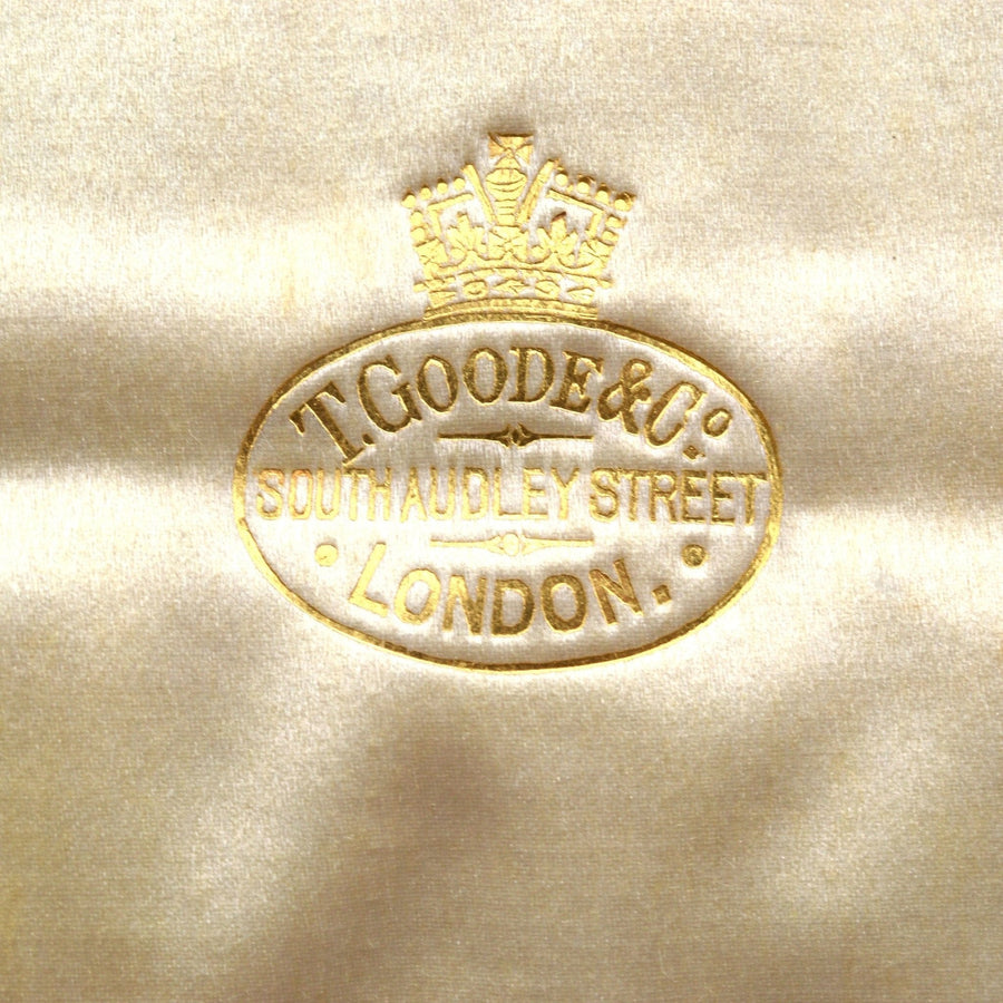 Embroidered logo of T. Goode & Co., South Audley Street, London, showcasing luxury craftsmanship.