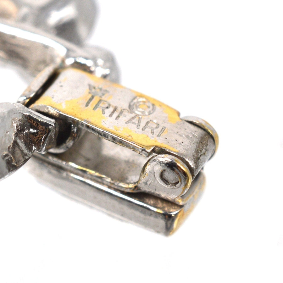 Close-up of Trifari 1950s bracelet clasp showcasing brand detail and vintage design.