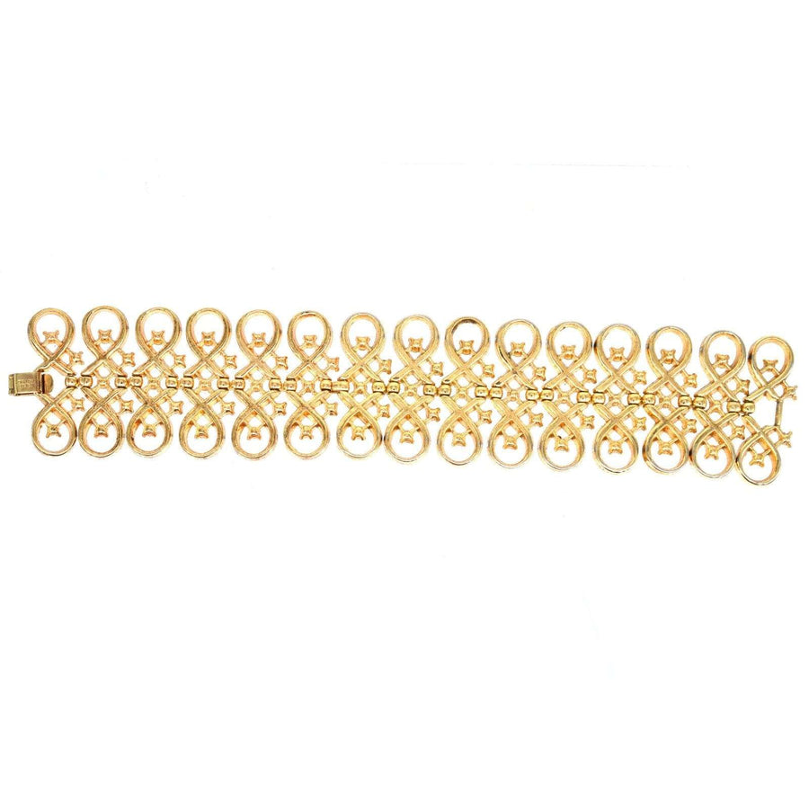 Trifari vintage gold-tone paste bracelet with interlinked swirls and diamond pastes, elegant and collectible jewelry.