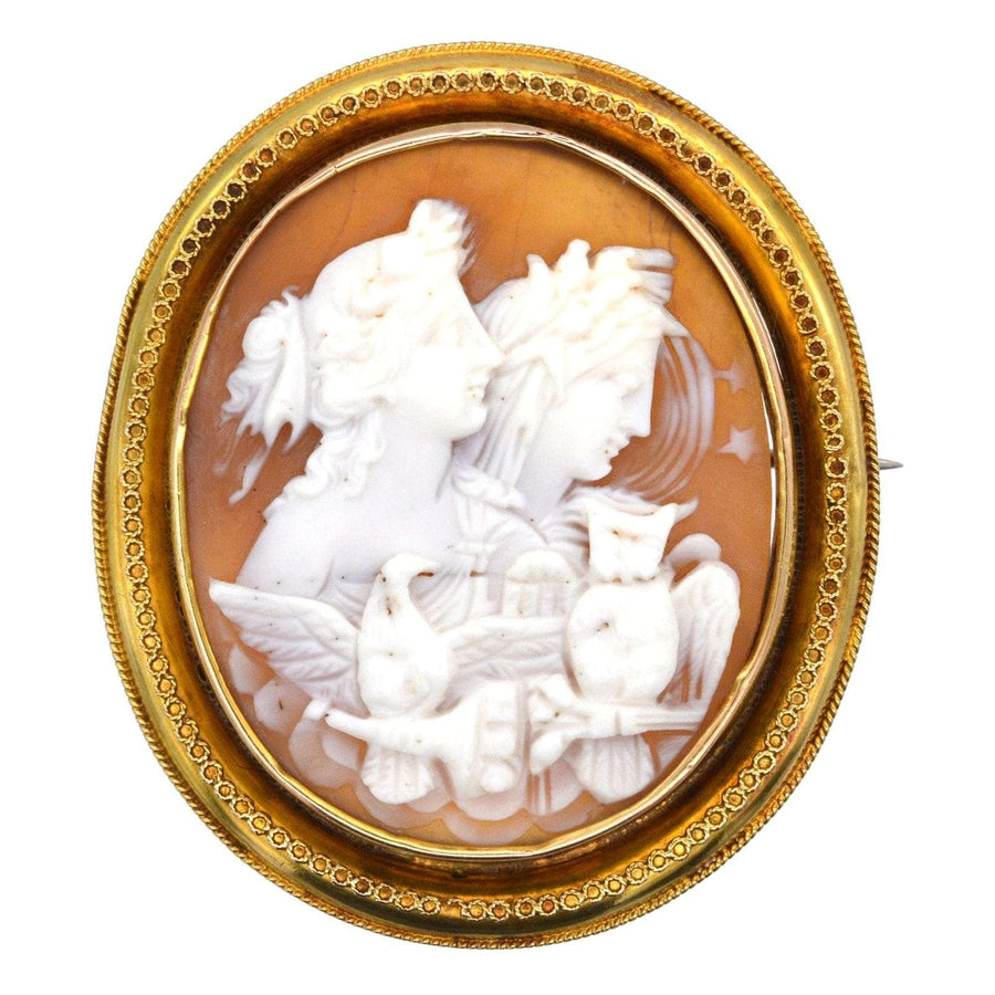 Victorian gold day and night shell cameo brooch depicting Eos and Selene with symbols of moon and stars.
