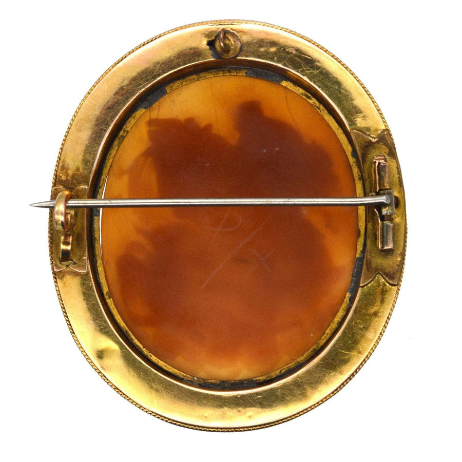Back view of a Victorian 15ct gold shell cameo brooch featuring an Etruscan style setting.