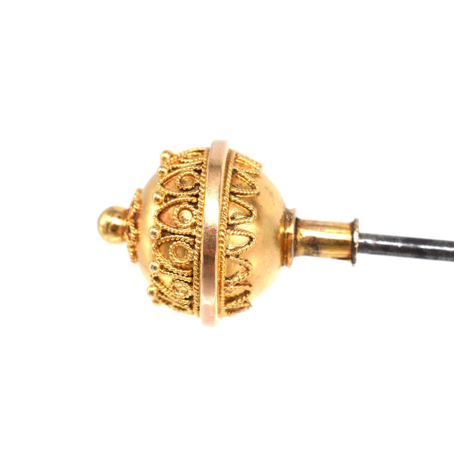 Victorian 15ct gold Etruscan ball hat pin featuring ornate scroll details and elegant design.
