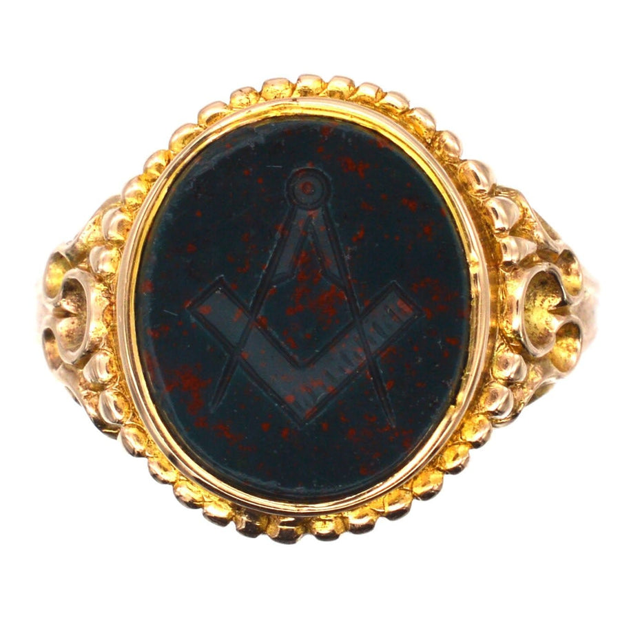 Victorian 15ct gold Masonic signet ring with engraved bloodstone, featuring the Square and Compasses emblem.