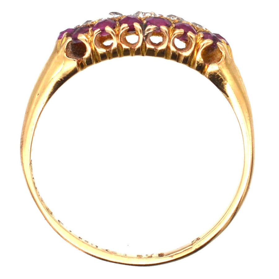 Victorian 18ct gold diamond and ruby cluster ring, showcasing five rubies and diamonds in a unique boat-shaped design.