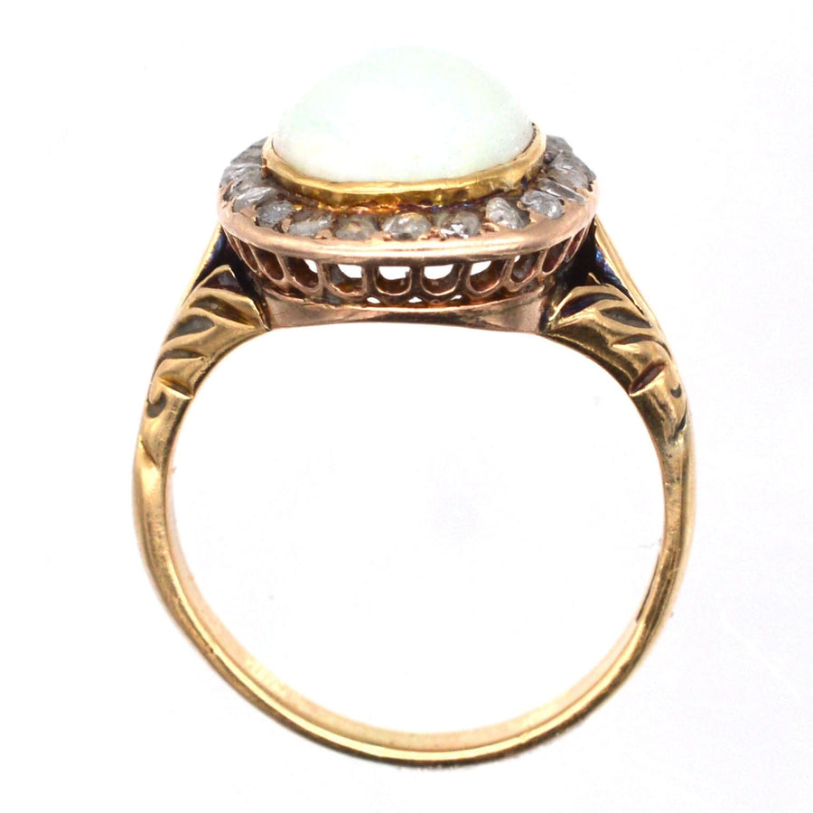 Victorian 18ct gold ring featuring a milky green opal and rose diamond cluster, elegant shank, vintage jewelry from the 1860s.