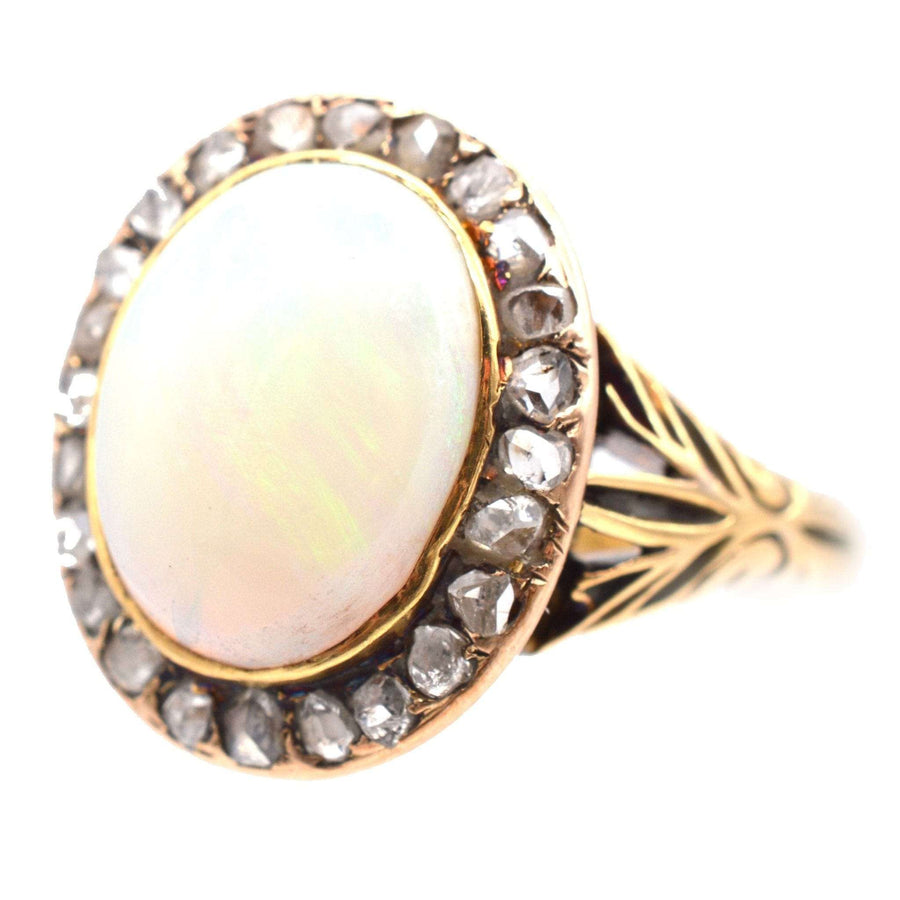 Victorian 18ct gold ring featuring a milky green opal and rose diamond cluster, elegant 1860s jewelry.