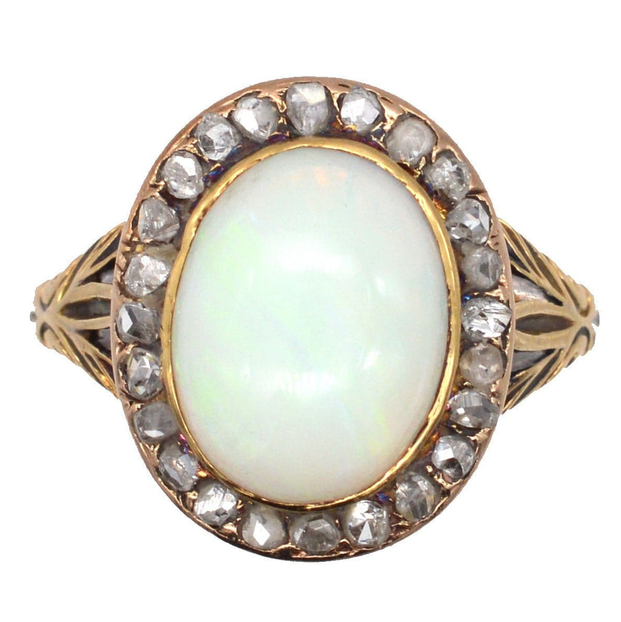 Victorian 18ct gold ring featuring a milky green opal center surrounded by rose diamonds, elegant cluster design.