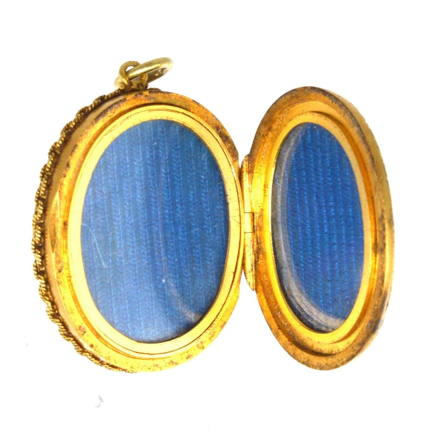 Victorian 18ct gold locket open, featuring blue interior, original case, and intricate detailing.