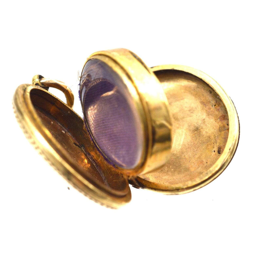 Victorian 9ct gold floral locket interior showcasing two compartments for precious keepsakes.