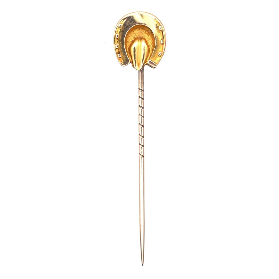 Victorian 9ct gold horseshoe tie pin symbolizing good luck and protection from evil, crafted circa 1880.