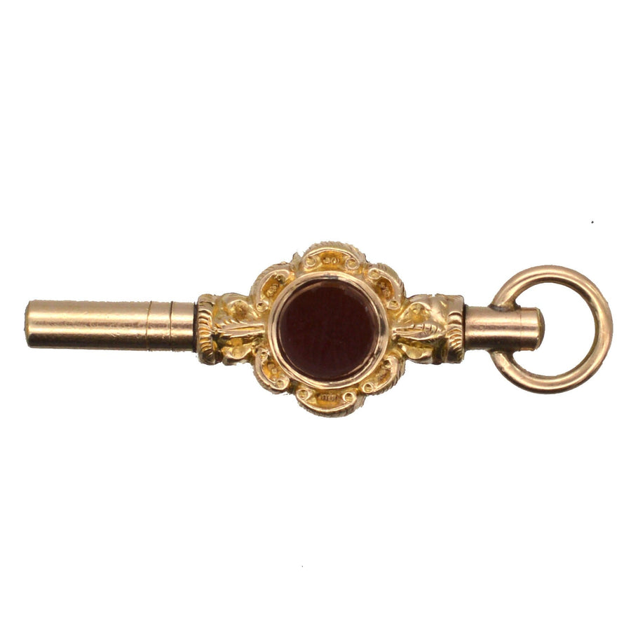 Victorian gold cased watch key featuring bloodstone and cornelian, dating from 1830-1850s, ideal as a pendant.