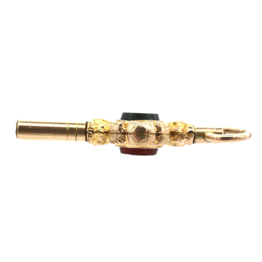 Victorian gold cased watch key featuring bloodstone and cornelian, elegant accessory from 1830-1850s.
