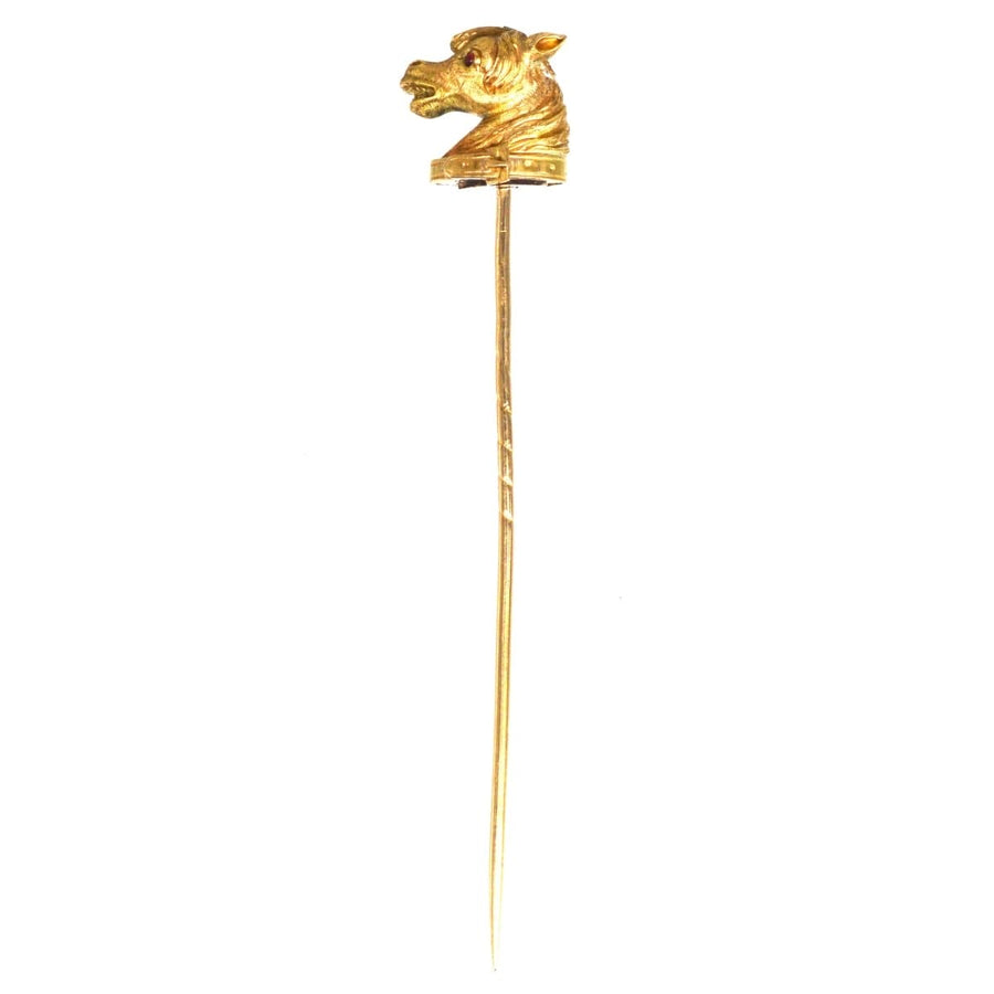 Victorian Scottish 18ct gold horse head tie pin with detailed design and ruby eyes, ideal for elegant silk ties.