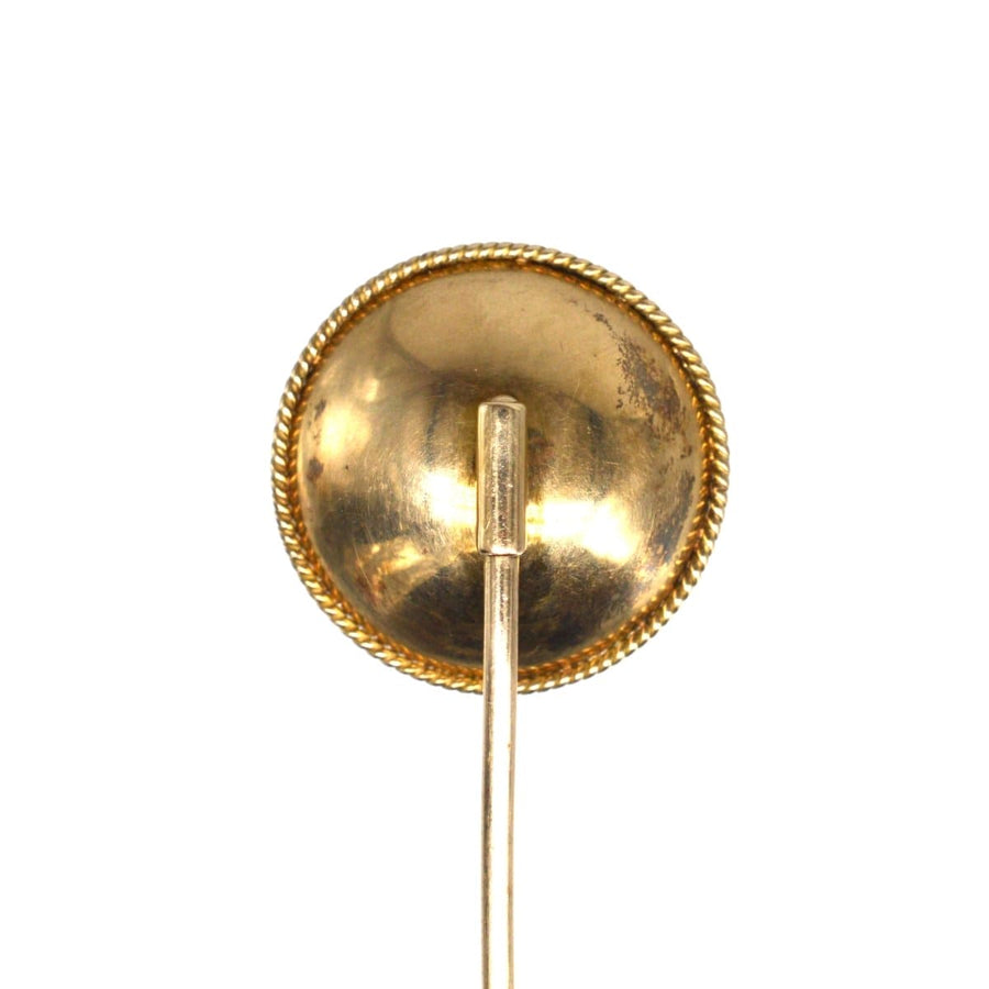Back view of a Victorian 9ct gold tie pin featuring a roped edge detail, circa 1870.