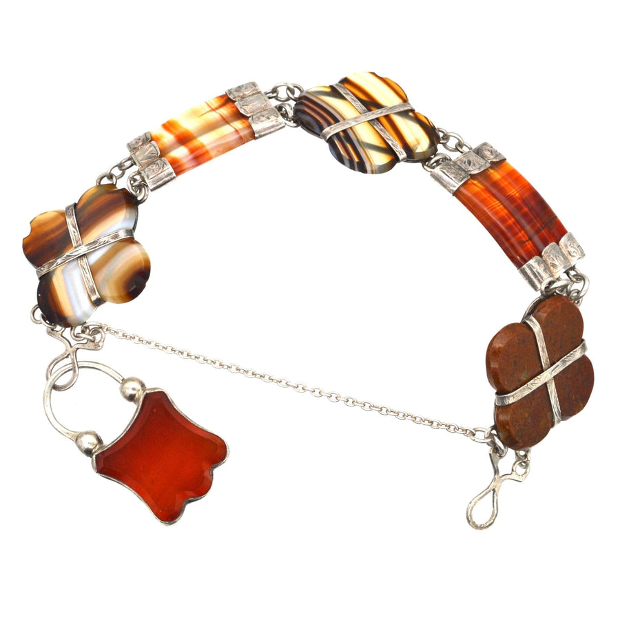 Victorian Scottish silver agate bracelet with carnelian and banded agate, circa 1860, featuring original padlock clasp.