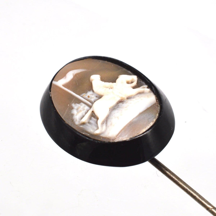 Victorian shell cameo tie pin featuring horse and rider on Whitby Jet, dating from 1860s-1880s.