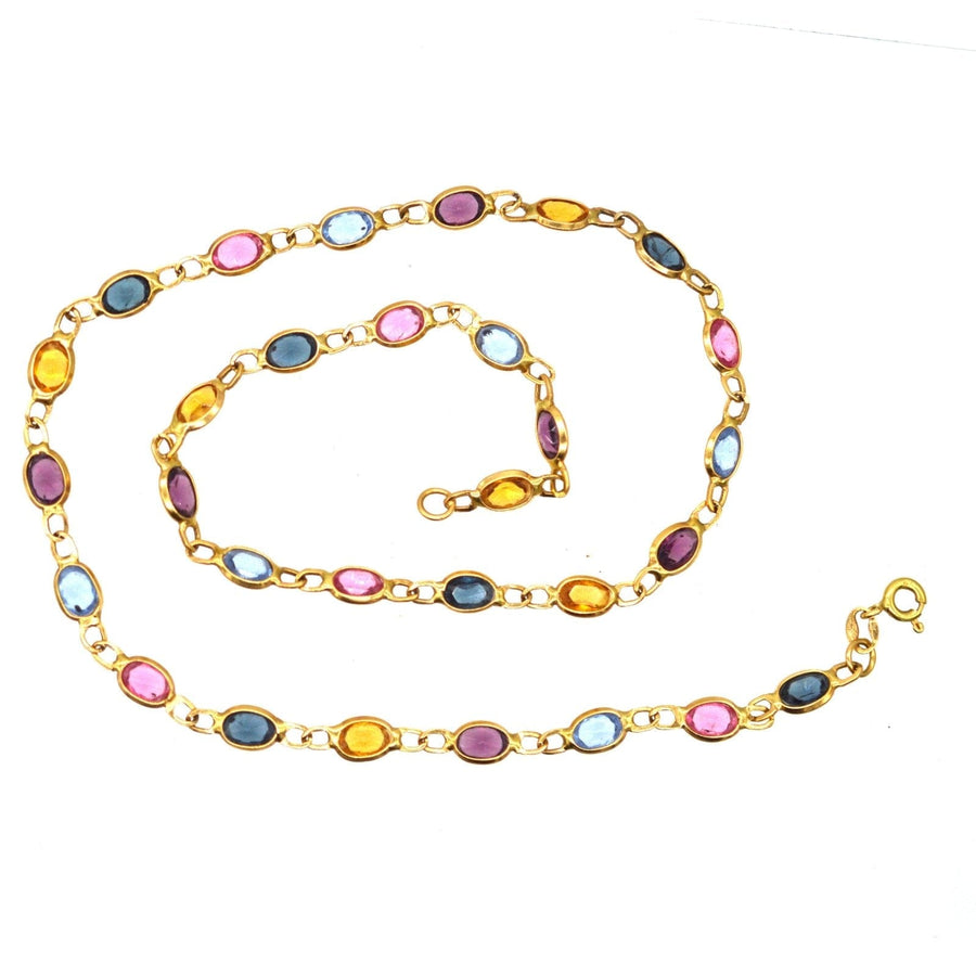 Vintage 18ct gold multi-stone necklace featuring colorful paste stones, a timeless and versatile jewelry piece.
