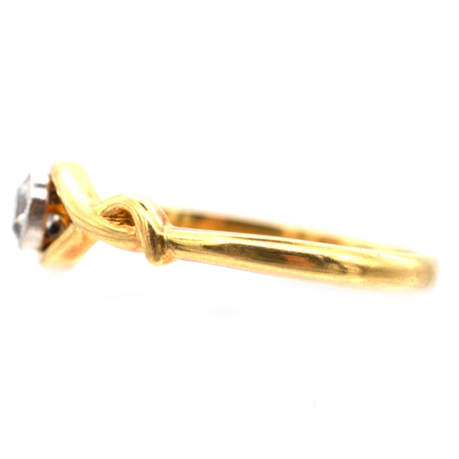 Vintage 18ct gold solitaire ring featuring a bezel-set 0.20 carat diamond, perfect for engagements.