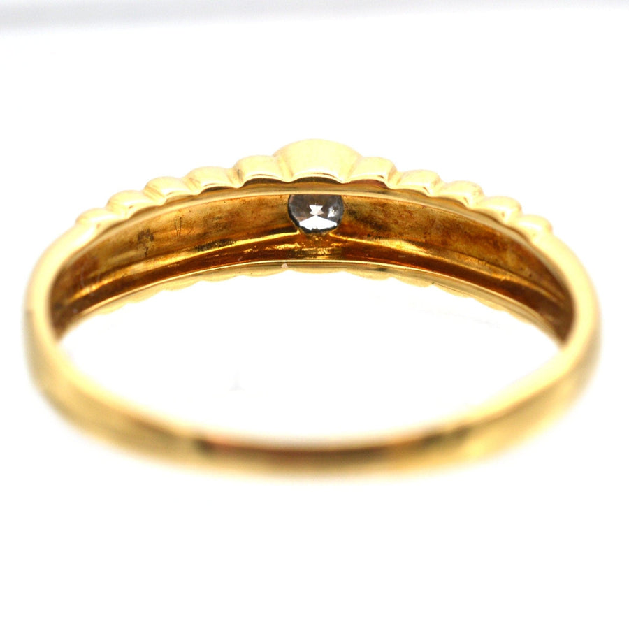 Inside view of vintage 18ct gold ring featuring diamond and laurel wreath design.