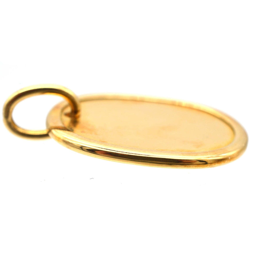 Vintage 18ct gold oval plain name tag pendant, perfect for engraving or everyday wear.